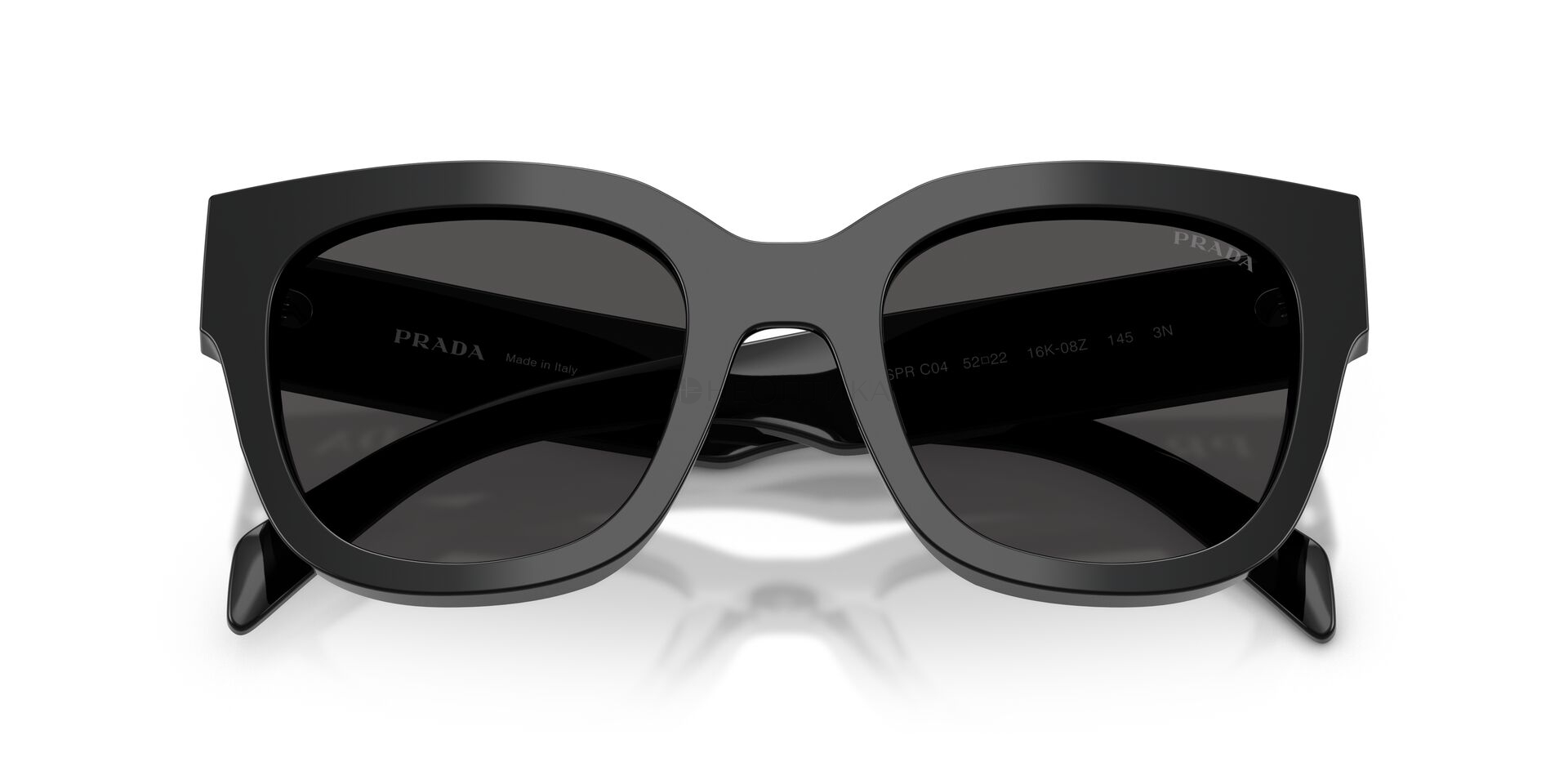 Солнцезащитные очки Prada  0PR C04S 16K08Z 52