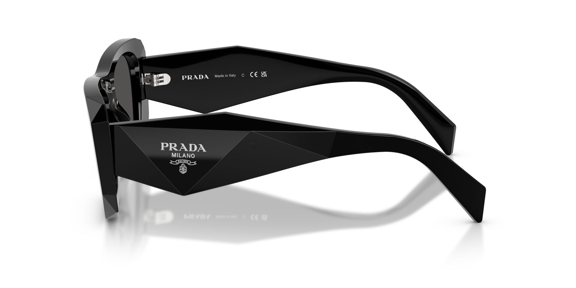 Солнцезащитные очки Prada  0PR B18S 16K08Z 53